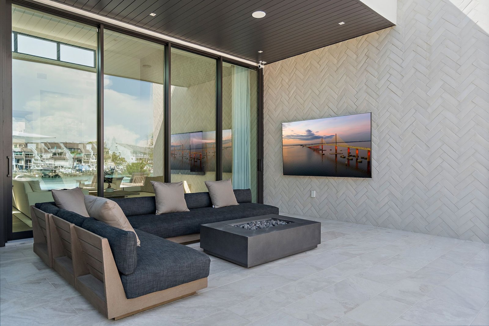 Covered outdoor lounge at a Crescent home in Tierra Verde