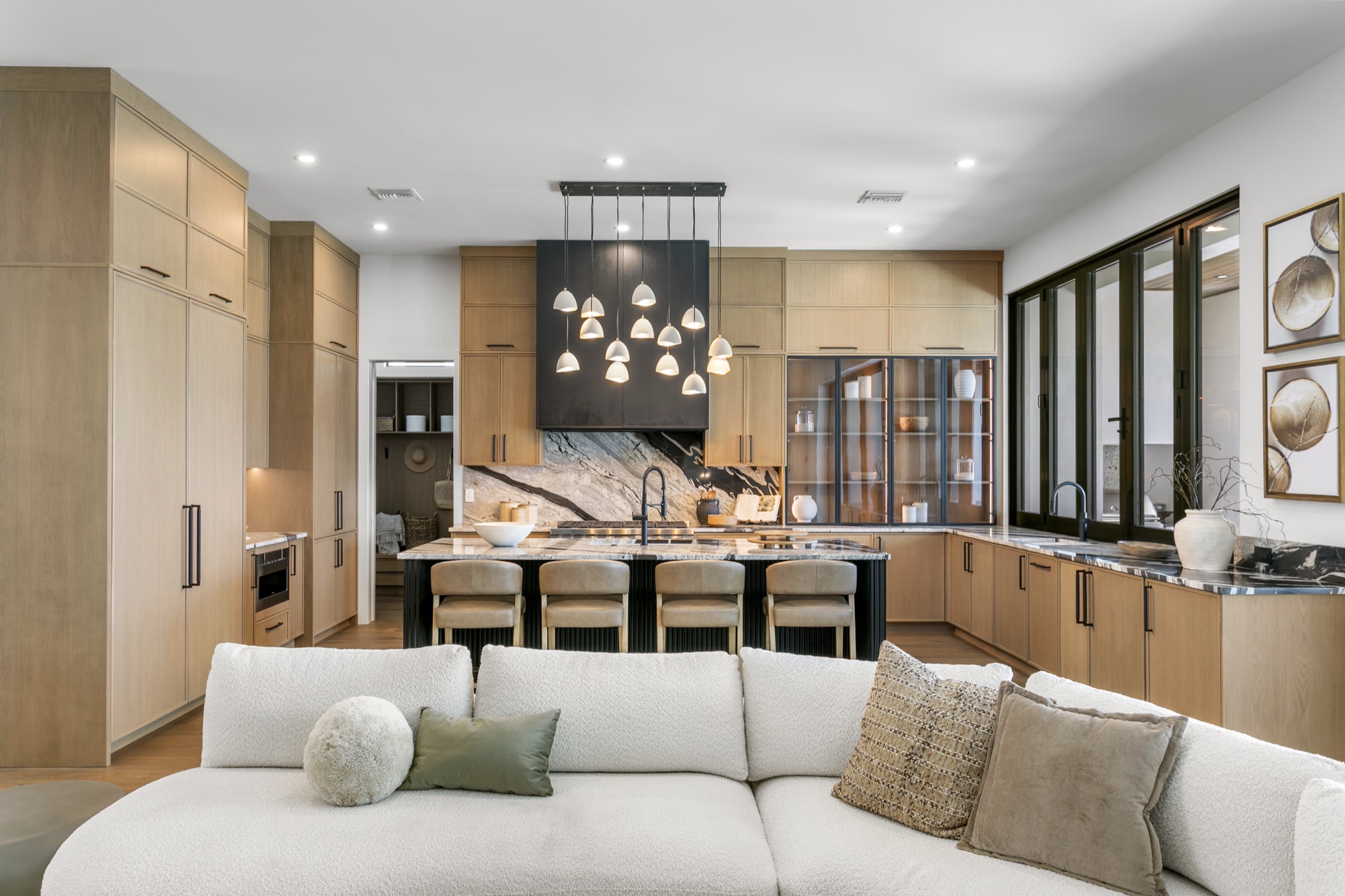 Kitchen and living room at a Crescent home on W San Miguel St, Tampa